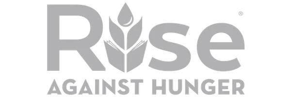 Rise Against Hunger logo featuring bold text with an stylized wheat stalk in black and red replacing the letter i, along with a water droplet graphic above it.